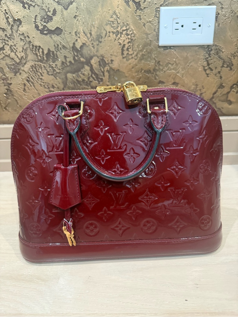 Louis Vuitton Vernis Alma Satchel in Deep Wine Red with Gold Hardware